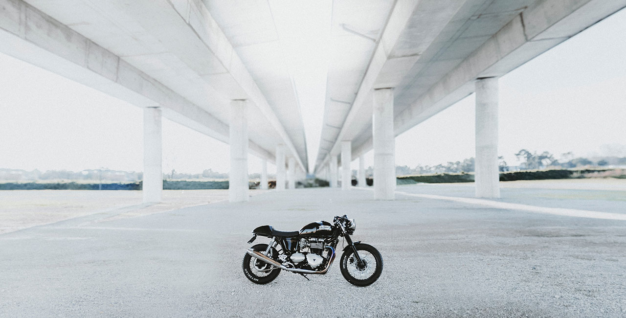 Black Motorcycle Under The Bridge